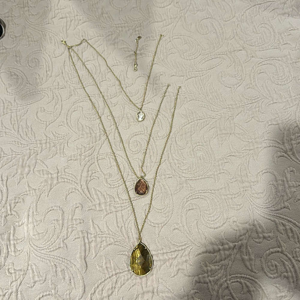 Chloe and Isabel gold three piece necklace, browns and clear stones.